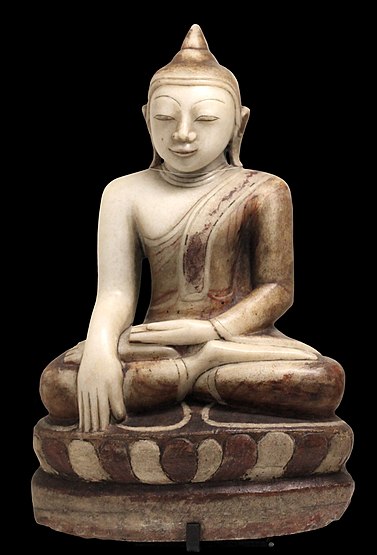 The Buddha sitting in bhūmisparśa mudrā. Birmany. White marble with traces of polychromy. Gallo-Roman Museum of Lyon-Fourvière