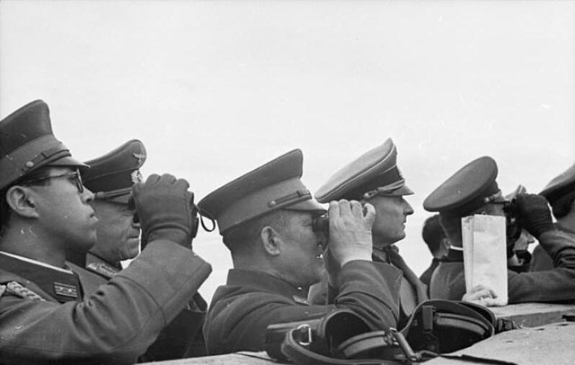 Ōshima (center) touring the Atlantic Wall with other Japanese and German officials in 1943