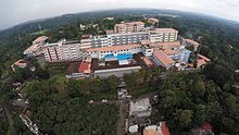 Caritas, a 635-bed hospital established and operated by the Knanaya community Caritas Hospital Aerial View.jpg