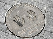 Richard's handprints at the Wembley Square of Fame in London Cliff Richard's hands.jpg