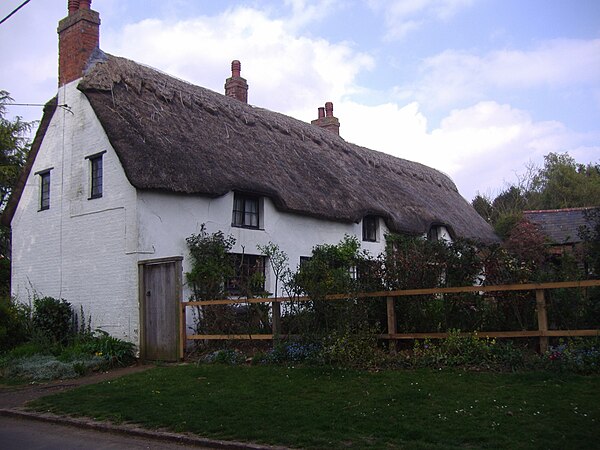 One of the two remaining cob and thatched cottages in the village