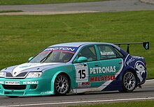 Hairuman driving for Proton at Brands Hatch during the 2004 British Touring Car Championship season. Farique Hairuman - Proton Impian at Brands Hatch at the BTCC on 25-04-2004 (50887579822).jpg