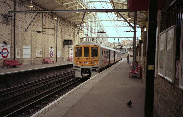 Farringdon station under British Rail with a Network SouthEast livery British Rail Class 319 on a Thameslink service