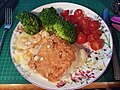Fish pie with extra prawns and a cheesey crust, with broccoli and cherry tomatoes (43472859461).jpg