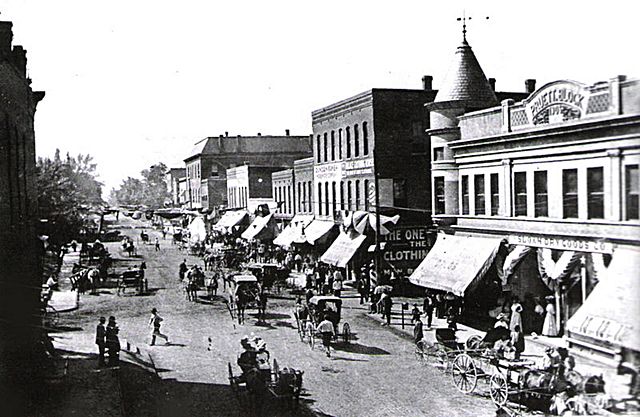 Locust St. crossing at Main St. West side of square in 1910.