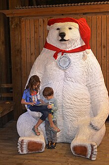 Thousands of visitors flock to the bonsai pavilion during Garden of Lights to have their children's pictures taken with Heathcote the Bear. Heathcote the Bear at Heathcote Botanical Gardens.jpg