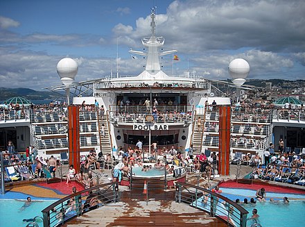 The swimming pool area and pool bar aboard MS Independence of the Seas