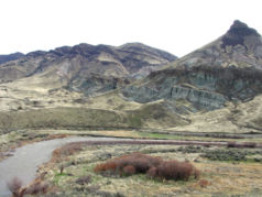 Layers of rock over the river