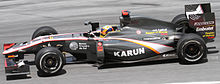 Karun Chandhok recorded the F110's first finish with fourteenth position at the Australian Grand Prix and led home the car's first double finish at the Malaysian Grand Prix (pictured). Karun Chandhok 2010 Malaysia 2nd Free Practice.jpg