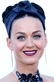 Katy Perry looking straight and smiling