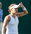 Lauren Davis competing in the first round of the 2015 Wimbledon Championships.