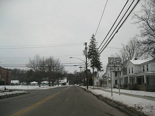 NY 88 leaves Main Street southbound and joins it northbound at the intersection of Carlton and Main streets, shown above.