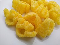 Although made from corn and not potato, Monster Munch are called crisps (potato chips) in Britain. Monster Munch pickled onion 2.jpg