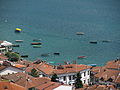 * Nomination Boats moored at Lake Ohrid, Macedonia. --Tropcho 08:23, 25 August 2015 (UTC) * Decline  Oppose Sorry, chromatic aberrations (see note), boats and sea with not good detail (see note), vignetting. The focus is on buildings. DOF (Exposure time: 1/500 and f/5)--Lmbuga 08:39, 25 August 2015 (UTC)