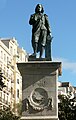 Monumento a Murillo, de Sabino Medina, de 1859 el original, en Sevilla, del que se hizo la réplica de 1871 que se encuentra en la Puerta de Murillo, entre el Museo del Prado y el Jardín Botánico de Madrid.[5]​