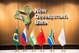 Bank's logo and BRICS flags