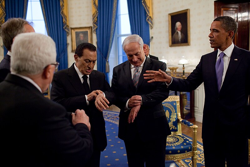File:Netanyahu and Mubarak checking their watches.jpg