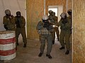 Operators of Hungarian Army's KMZ enters a room while attacking the unit's killing house.