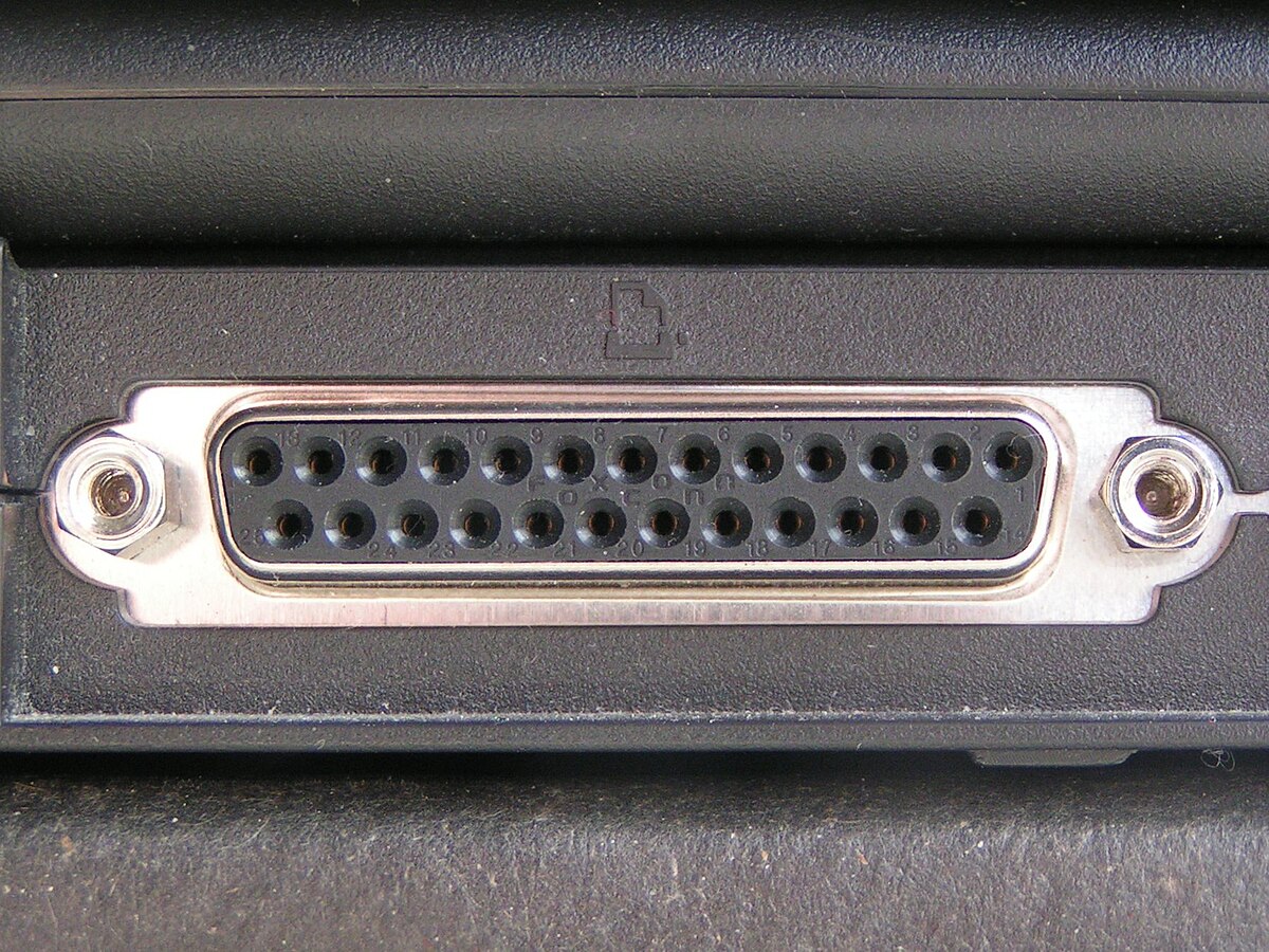 What type of cable do most scanners use to connect to a PC?