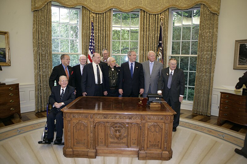 File:President George W. Bush and Senator Ted Stevens welcome World War II veterans of the 322nd Troop Carrier Squadron (81).jpg