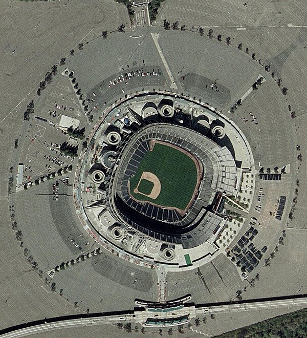 Satellite view of then-Qualcomm Stadium in March 2003, with the trolley line at the bottom of the image.