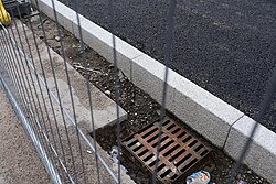 New kerbstones on Guildhall Road in place at Queen's Gardens in Kingston upon Hull, which is partway through major renovation works.