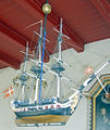 Votivskibet er en fregat skænket af kromanden Albert Christian Hjort, som havnede i Norsminde efter et forlis
