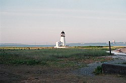 A more recent view of the Prudence Island Light, with the Mt. Hope Bridge in the background