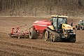 Sowing seeds ^ rolling the ground at same time. - panoramio.jpg
