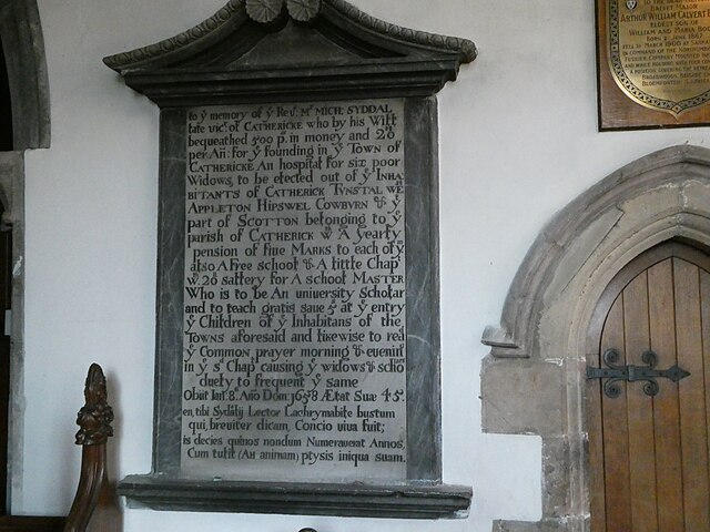 The Memorial to the Rev. Michael Sydall in St Anne’s, Catterick; his name lives on in the local school