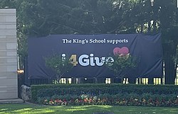 A temporary banner outside The King's School, Parramatta displaying their support for the i4Give Foundation in February 2023. TKS supports i4Give.jpg