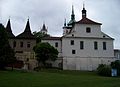 Čeština: Teplice, okres Teplice. Lázeňské náměstí, Kolostujovy věžičky a kostel sv. Jana Křtitele.. English: Teplice, Teplice District, Ústí nad Labem Region, Czech Republic. Lázeňské náměstí, Zámecké náměstí 520/2 and church of Saint John the baptist. Camera location 50° 38′ 14.9″ N, 13° 49′ 41.1″ E    View all coordinates using: OpenStreetMap