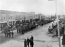 Soldiers and veterans of the Detroit Light Guard march in a funeral in Byron, 1900 The Detroit Light Guard - a complete record of this organization from its foundation to the present day - with full account of riot and complimentary duty, and the campaigns in the Civil and (14759619351).jpg