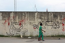 Graffiti on the wall of Australian embassy in Dili (2014) Timor Oil Graffiti.jpg