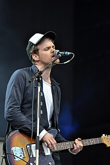 Tobias Kuhn performing with Thees Uhlmann at the 2013 Greenville Festival. Tobias Kuhn with Thees Uhlmann and Band - Greenville-Festival-2013-14.jpg