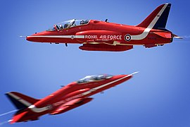 Two Hawks from the Red Arrows pass within feet of each other whilst practising the terrifying Gypo Pass as part of their display routine over RAF Akrotiri, Cyprus.