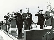 Ceremony to award Hope the Distinguished Public Service Award aboard USS Providence US Navy 030728-N-0000X-003 (Jan. 1971) Entertainer Bob Hope (center) and other guests salute while playing the, Star Spangled Banner during a ceremony to award Bob Hope the Distinguished Public Service Award.jpg