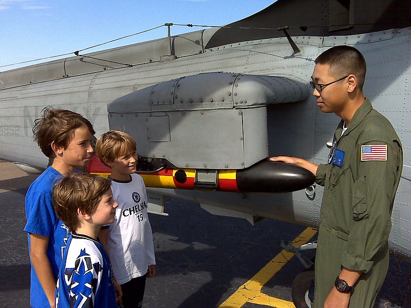 File:US Navy 080920-N-7443N-023 Aviation Structural Mechanic 3rd Class Andy King describes the anti-submarine capabilities of an SH-60 Sea Hawk helicopter to visitors at Owens Field in Columbia, S.C.jpg