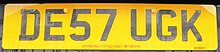 A British car number plate United Kingdom license plate DE57 UGK back.jpg