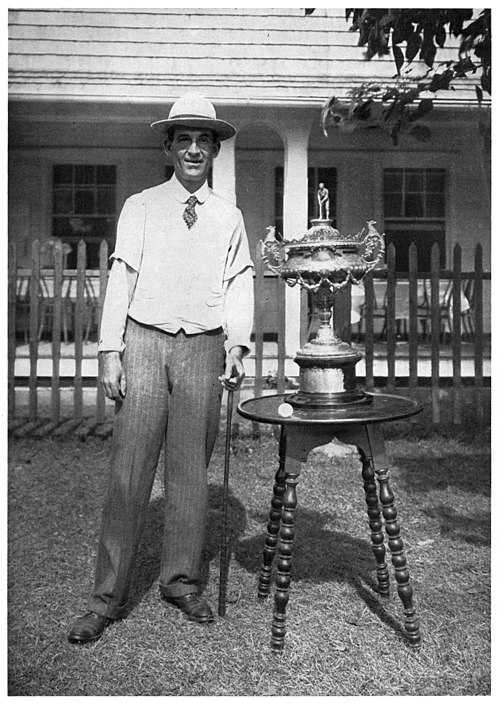 Travis with 1901 U.S. Amateur trophy and rubber-cored ball