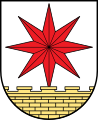 Gemeinde Bösingfeld gültig bis 31. Dezember 1968 "In Silber ein achtstrahliger roter Stern über einer natürlich sandsteinfarbenen Zinnenmauer im Schildfuß."