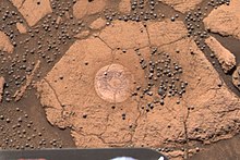 Figure 11. Site of "berry bowl" experiment. The two sampling targets are next to each other. Image taken on Sol 48 (2004-03-13). Xpe pubeng approved 032304 color berry bowl-B060R1 br.jpg