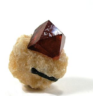 <span class="mw-page-title-main">Zircon</span> Zirconium silicate, a mineral belonging to the group of nesosilicates