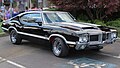 1971 Oldsmobile 4-4-2 hardtop coupe with W-30 package, front right view