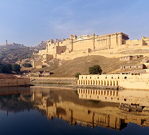 Amber Fort has seen from the bank of Maotha Lake, Jaigarh Fort on the hills in the background