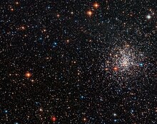 A globular cluster's striking red eye NGC 2108.jpg