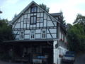 Half-timbered house with workshop