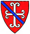 Arms of Sir Guy Ferre (d. 1323), steward of Queen Eleanor of Castile: Gules, a fer-de-moline argent over all a bendlet azure. As seen sculpted on gatehouse of Butley Priory Arms of Sir Guy Ferre.jpg