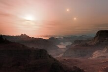 Artist’s impression of sunset on the super-Earth world Gliese 667 Cc.tif