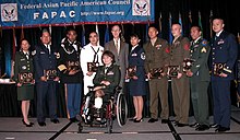 Nine servicemembers representing the four active duty services, reserve components and the Coast Guard were presented the Federal Asian Pacific American Council's Military Meritorious Service Award during the Defense Department's Asian Pacific American Heritage Month luncheon and military awards ceremony in Arlington, Va., 2 June.